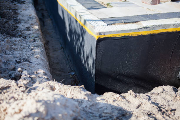 Professional Foundation Crack Repair technician working in Cement City, MI